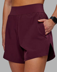 Woman wearing Challenger 5" Lined Performance Short - Cherry Lacquer | Model:Keisha | Size:S