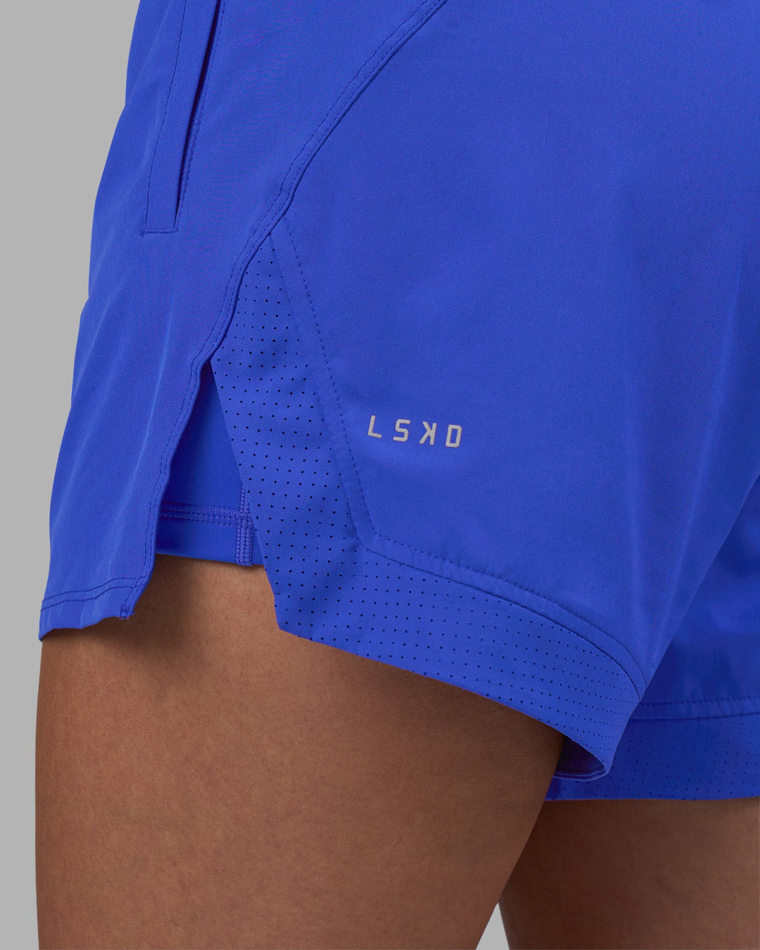 Woman wearing Challenger 5&quot; Lined Performance Short - Power Cobalt | Model:Rhiley | Size:S