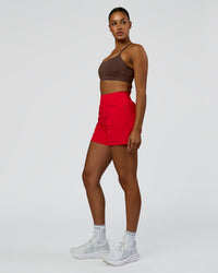 Woman wearing Challenger 5" Lined Performance Short - Scarlet | Model:Rosie | Size:S