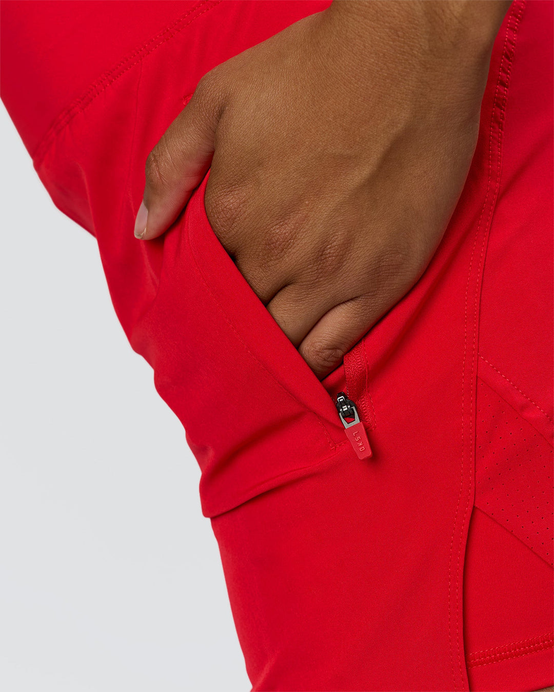Woman wearing Challenger 5" Lined Performance Short - Scarlet | Model:Rosie | Size:S
