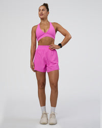 Woman wearing Challenger 5" Lined Performance Short - Ultra Fuchsia | Model:Abbey | Size:S