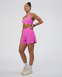 Woman wearing Challenger 5" Lined Performance Short - Ultra Fuchsia | Model:Abbey | Size:S