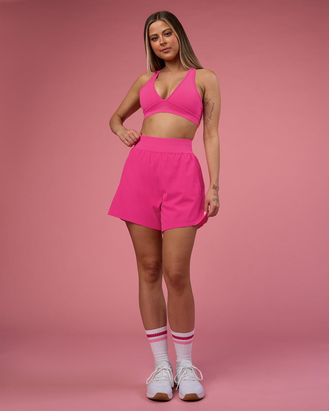 Woman wearing Challenger 5" Lined Performance Short - Ultra Pink | Model:Tianah | Size:S
