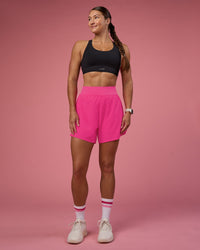 Woman wearing Challenger 5" Lined Performance Short - Ultra Pink | Model:Hannah | Size:S