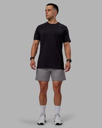 Man wearing Challenger 6" Performance Shorts - Storm Front