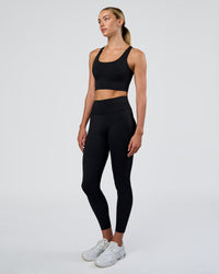Woman wearing Circuit Longline Sports Bra - Black | Model:Evie | Size:S | Thumbnail Index: 4