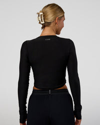 Woman wearing Clarity Long Sleeve Tee - Black | Model:Amity | Size:S