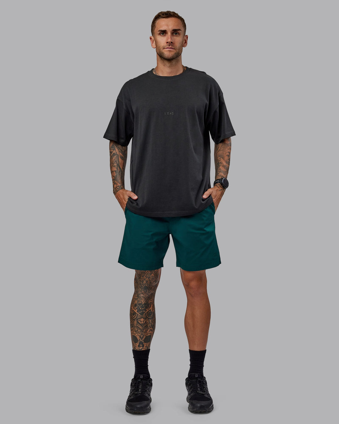 Man wearing Daily 7" Shorts - Dark Moss - view 3