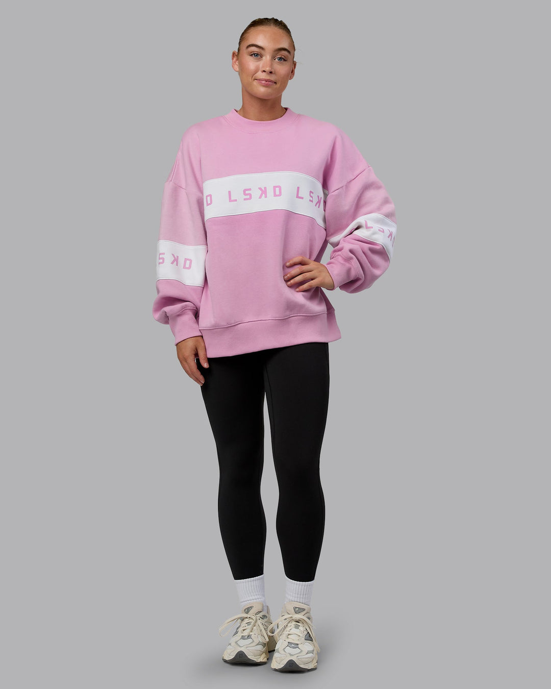 Woman wearing Disc Oversized Sweater - Bubblegum-Light Bubblegum