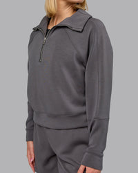 Woman wearing Elevate SoftTouch 1/2 Zip Sweater - Asphalt | Model:Halle | Size:S