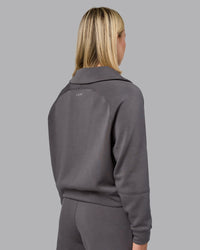Woman wearing Elevate SoftTouch 1/2 Zip Sweater - Asphalt | Model:Halle | Size:S