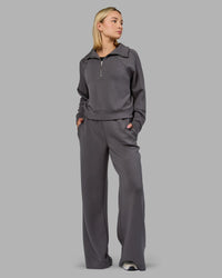 Woman wearing Elevate SoftTouch 1/2 Zip Sweater - Asphalt | Model:Halle | Size:S