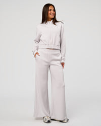 Woman wearing Elevate SoftTouch Cropped Full Zip Jacket - Clay | Model:Bianca | Size:S