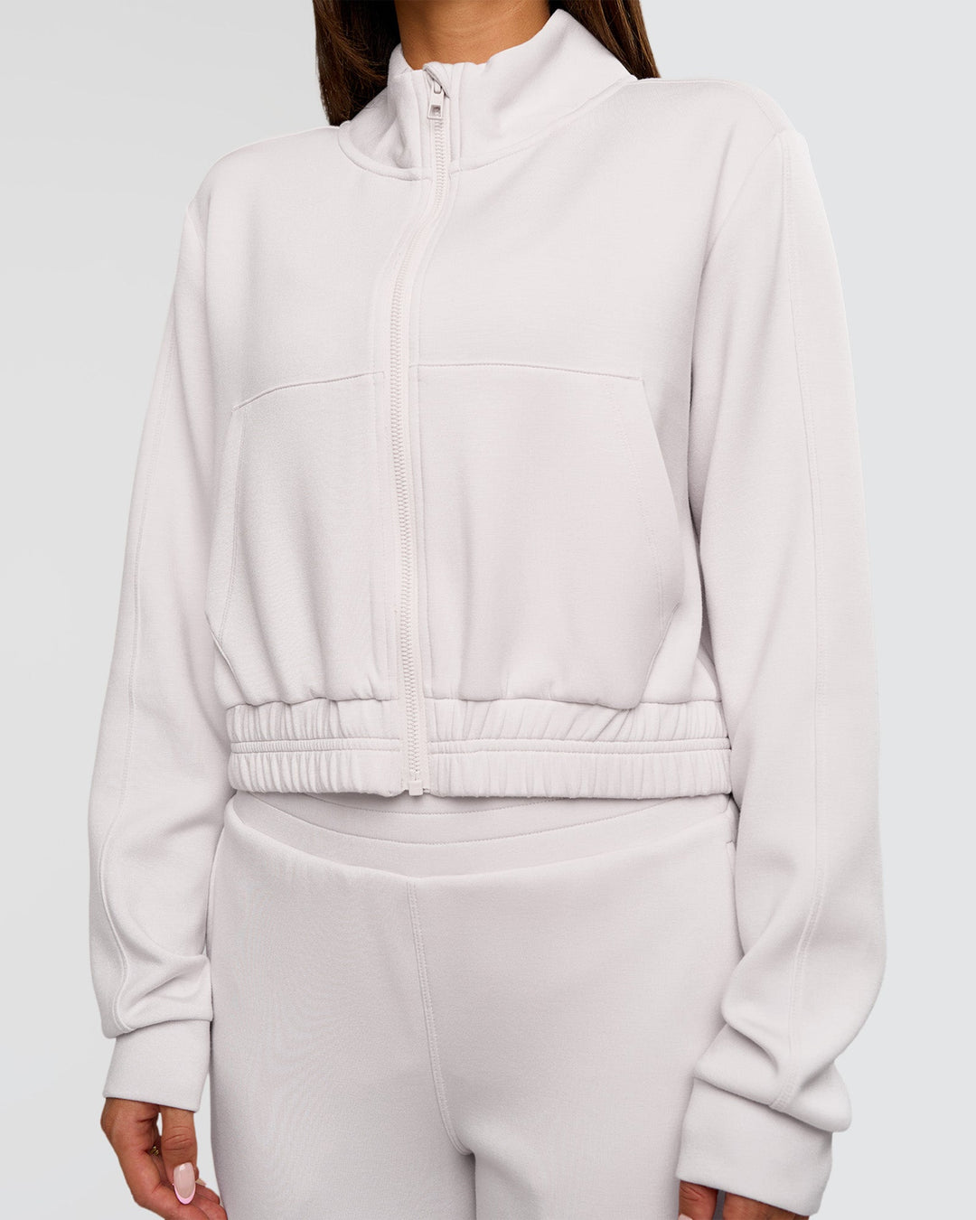 Woman wearing Elevate SoftTouch Cropped Full Zip Jacket - Clay | Model:Bianca | Size:S