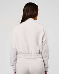 Woman wearing Elevate SoftTouch Cropped Full Zip Jacket - Clay | Model:Bianca | Size:S