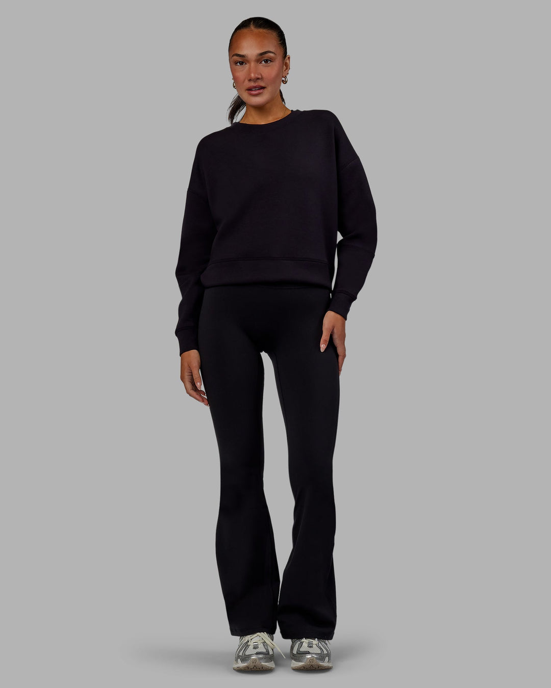 Woman wearing Elevate SoftTouch Crew Neck Sweater - Black-Black