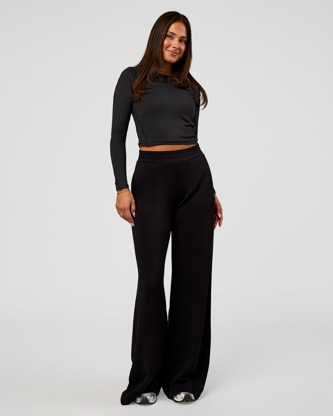 Woman wearing Elevate SoftTouch Wide Leg Pant Tall - Black | Model:Bianca | Size:S