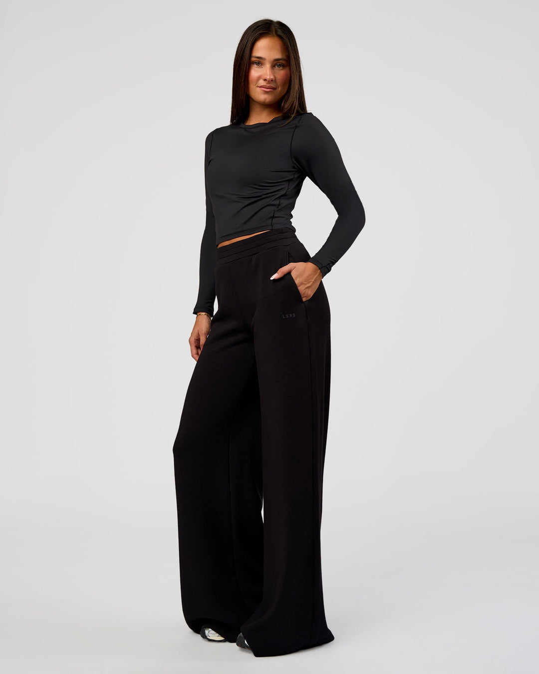 Woman wearing Elevate SoftTouch Wide Leg Pant Tall - Black | Model:Bianca | Size:S