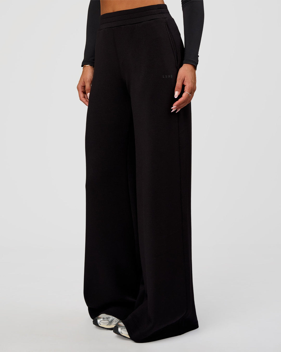 Woman wearing Elevate SoftTouch Wide Leg Pant Tall - Black | Model:Bianca | Size:S