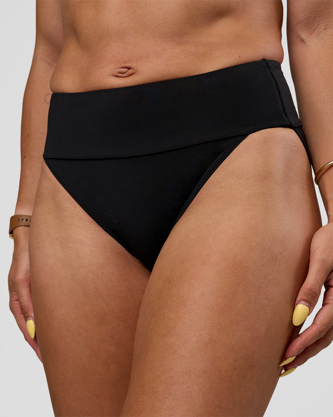 Woman wearing Elevate Sprinting Brief - Black | Model:Bree | Size:S