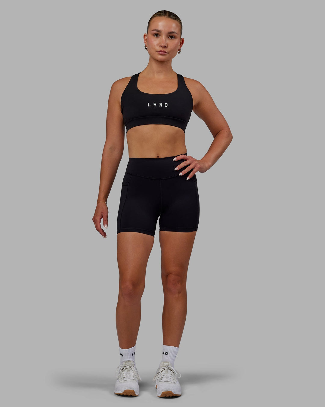 Woman wearing Elite X-Length Shorts - Black