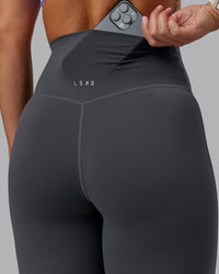Woman wearing Elixir Ultra High-Rise Full Length Leggings in Dark Storm | Size:S