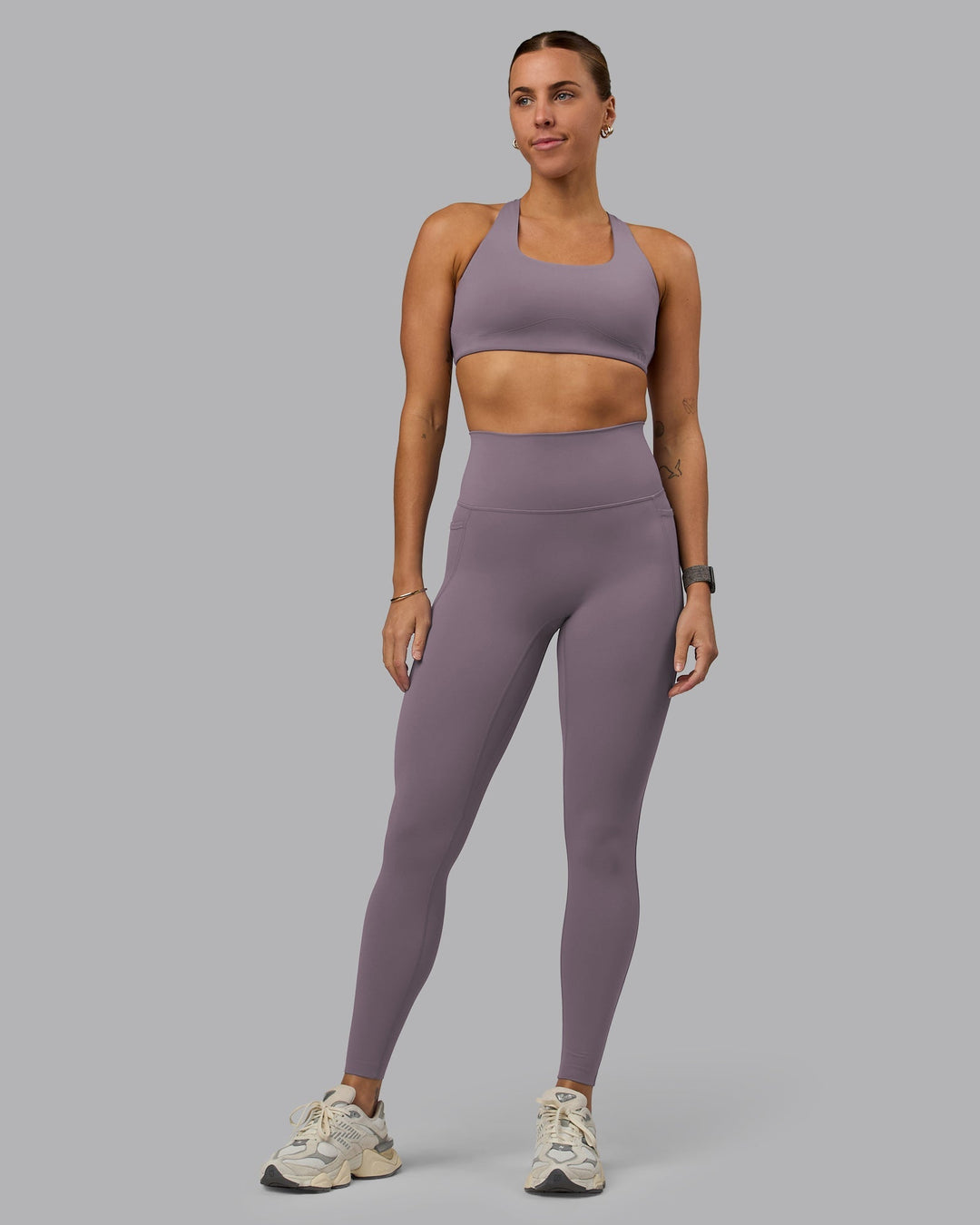 Woman wearing Elixir Ultra High-Rise Full Length Legging Pockets - Purple Sage