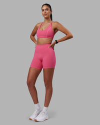 Woman wearing Elixir High-Rise 6" Short - Hot Pink | Model:Rhiley | Size:S