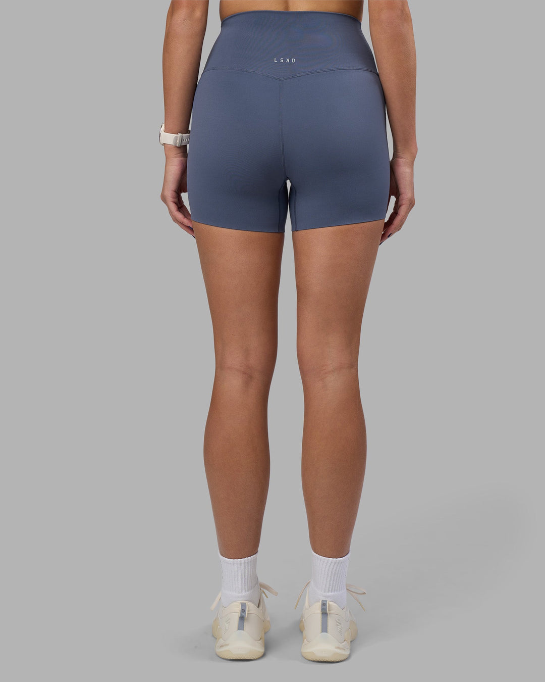 Woman wearing Elixir Ultra High-Rise 4&quot; Short - Night Shadow | Model:Phoebe | Size:S