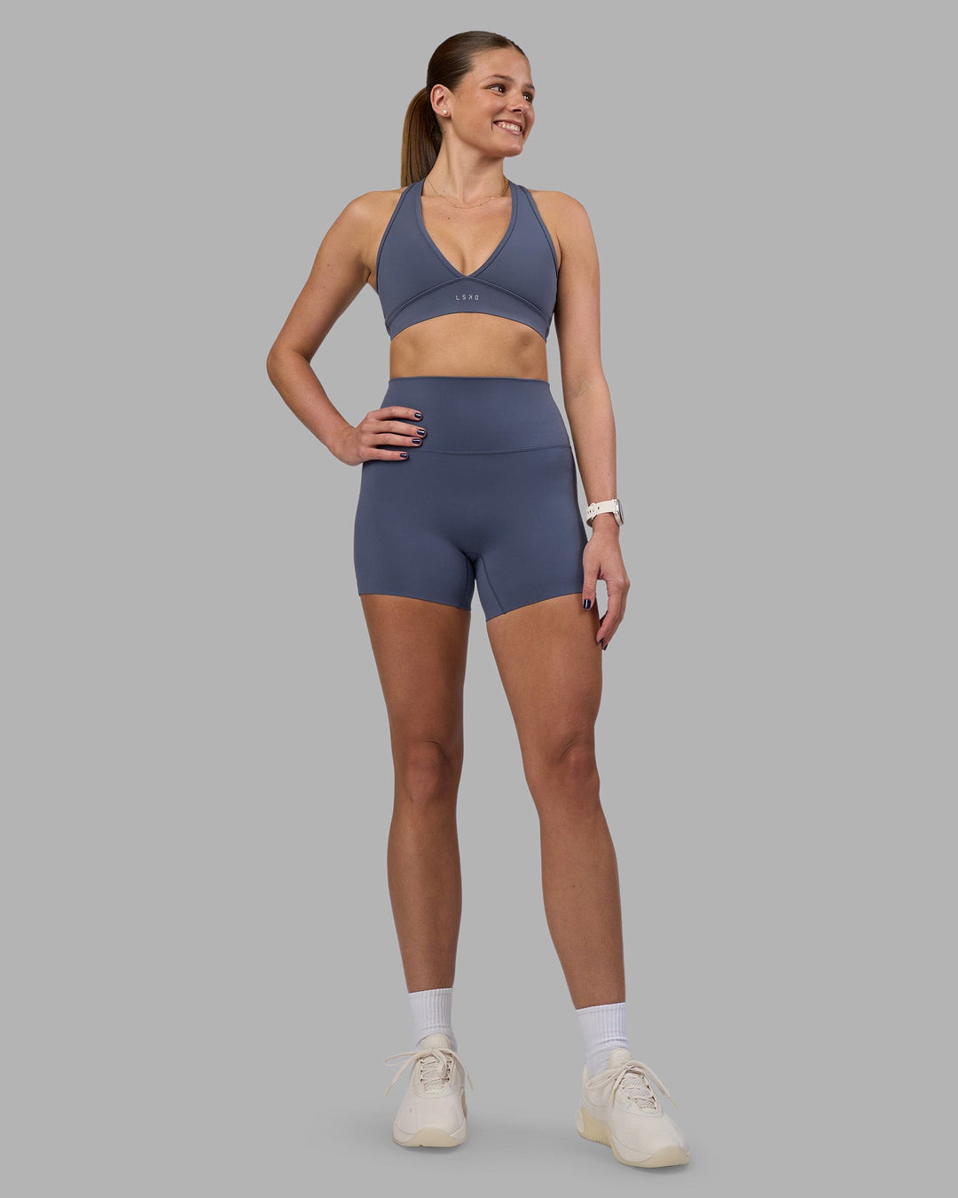 Woman wearing Elixir Ultra High-Rise 4&quot; Short - Night Shadow | Model:Phoebe | Size:S