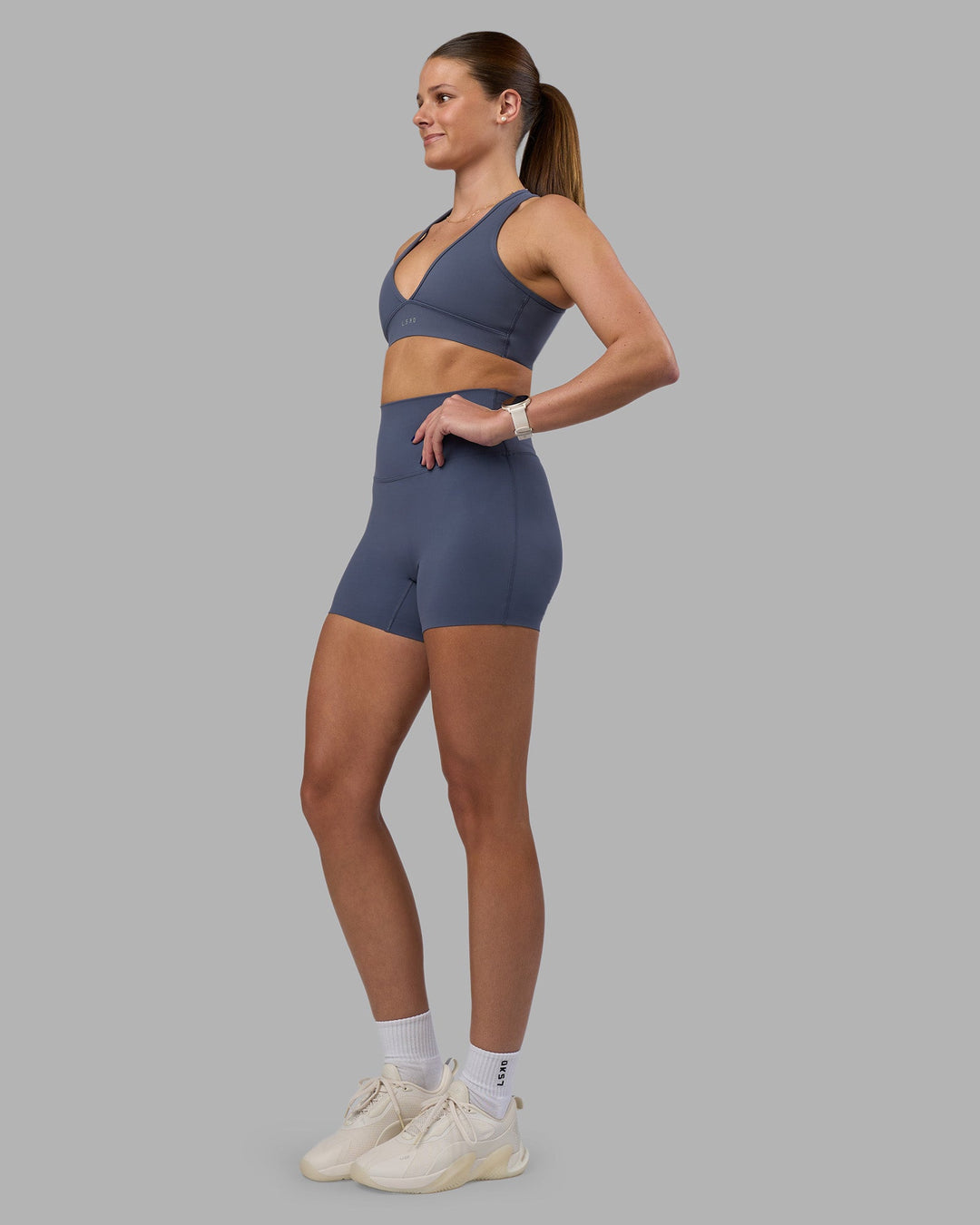 Woman wearing Elixir Ultra High-Rise 4&quot; Short - Night Shadow | Model:Phoebe | Size:S