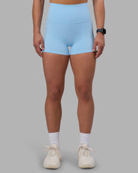 Woman wearing Elixir Ultra High-Rise 4" Short Pockets - Open Air | Model:Keisha | Size:S