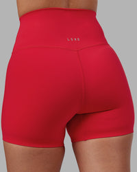 Woman wearing Elixir Ultra High-Rise 4" Short - Scarlet | Model:Rhiley | Size:S