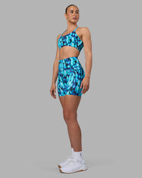 Woman wearing Elixir Ultra High-Rise 6" Short Pockets - Luminous | Model:Sophie | Size:S