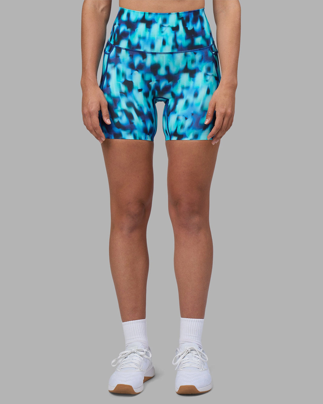 Woman wearing Elixir Ultra High-Rise 6" Short Pockets - Luminous | Model:Sophie | Size:S