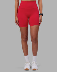 Woman wearing Elixir Ultra High-Rise 6" Short - Scarlet | Model:Rhiley | Size:S