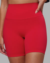 Woman wearing Elixir Ultra High-Rise 6" Short - Scarlet | Model:Rhiley | Size:S