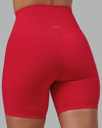 Woman wearing Elixir Ultra High-Rise 6" Short - Scarlet | Model:Rhiley | Size:S