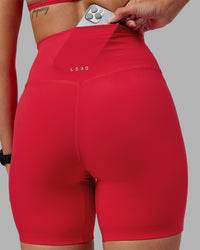 Woman wearing Elixir Ultra High-Rise 6" Short - Scarlet | Model:Rhiley | Size:S