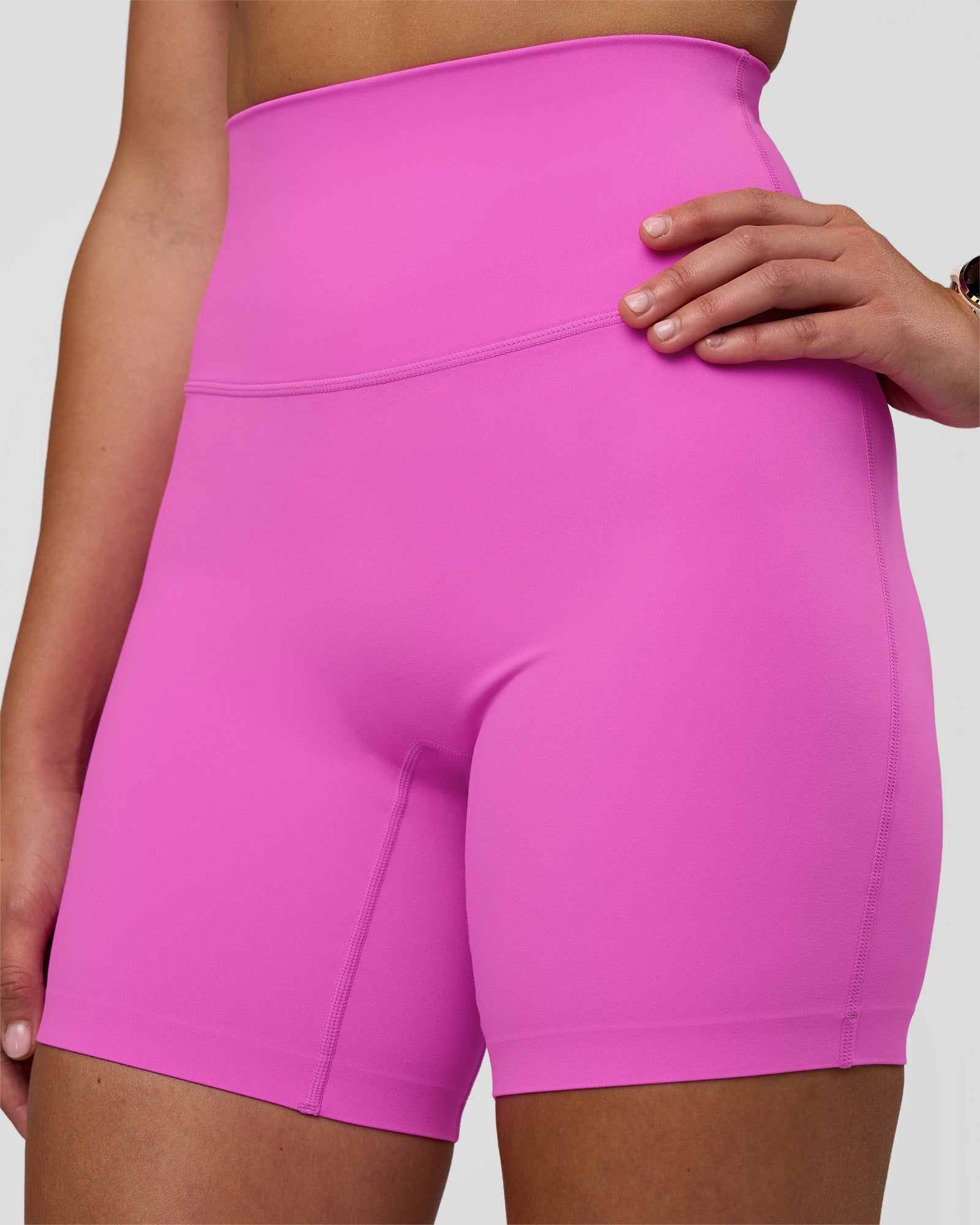 Woman wearing Elixir Ultra High-Rise 6" Short - Ultra Fuchsia | Model:Myrte | Size:S