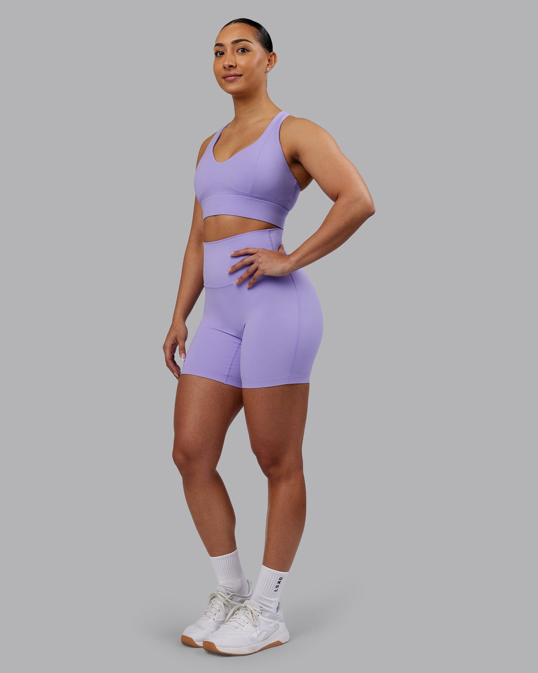 Woman wearing Elixir Ultra High-Rise 6" Short - Violet Ray | Model:Ayla | Size:S