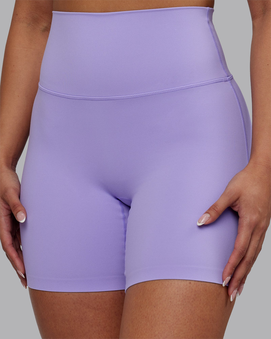 Woman wearing Elixir Ultra High-Rise 6" Short - Violet Ray | Model:Ayla | Size:S