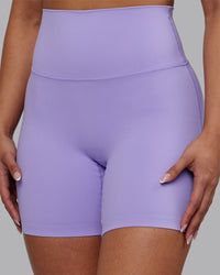 Woman wearing Elixir Ultra High-Rise 6" Short - Violet Ray | Model:Ayla | Size:S