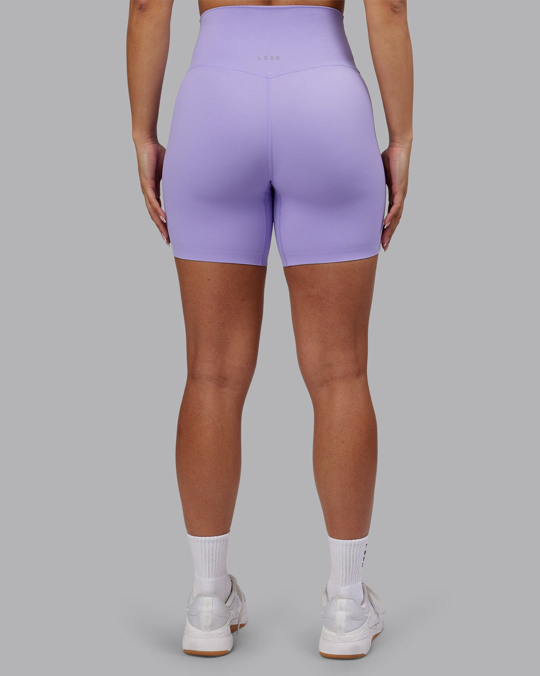 Woman wearing Elixir Ultra High-Rise 6" Short - Violet Ray | Model:Ayla | Size:S