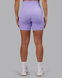 Woman wearing Elixir Ultra High-Rise 6" Short - Violet Ray | Model:Ayla | Size:S