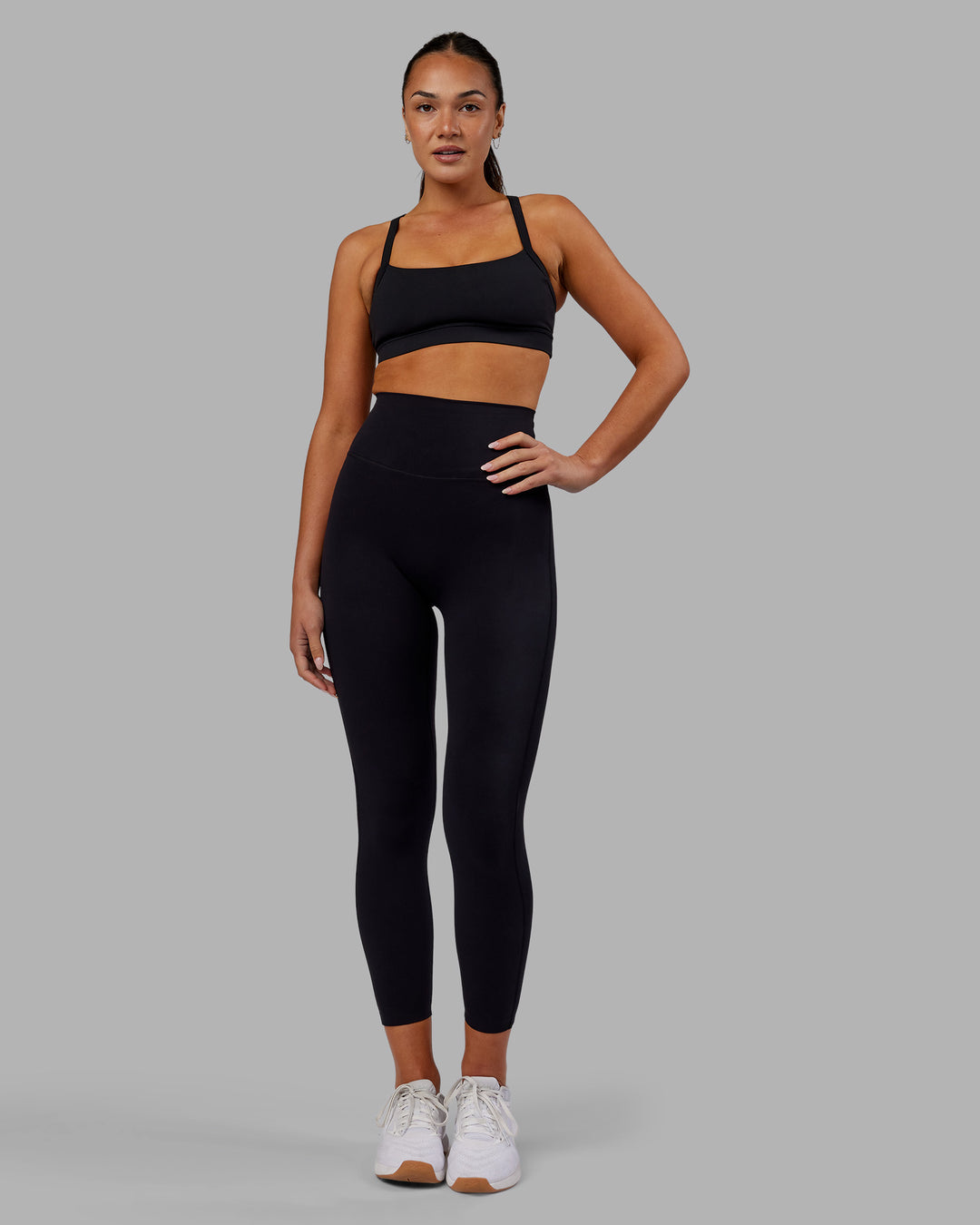Woman wearing Elixir Ultra High-Rise 7/8 Legging - Black | Model:Kirstyn | Size:S