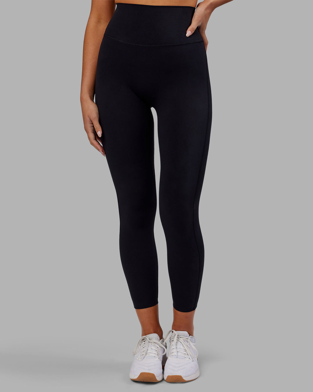 Woman wearing Elixir Ultra High-Rise 7/8 Legging - Black | Model:Kirstyn | Size:S