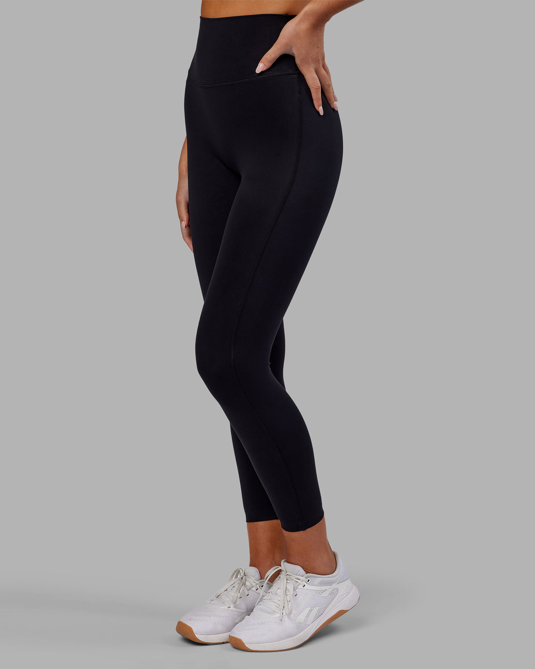 Woman wearing Elixir Ultra High-Rise 7/8 Legging - Black | Model:Kirstyn | Size:S