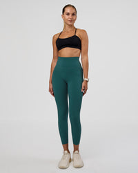 Woman wearing Elixir Ultra High-Rise 7/8 Legging Pockets - Transformative Teal | Model:Myrte | Size:S | Thumbnail Index: 0