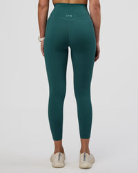 Woman wearing Elixir Ultra High-Rise 7/8 Legging Pockets - Transformative Teal | Model:Myrte | Size:S | Thumbnail Index: 3